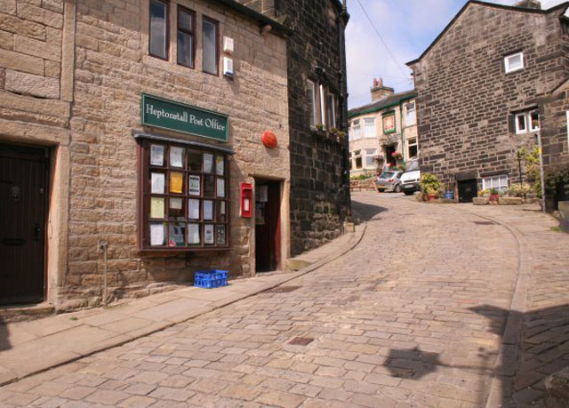 A Post office in a cobbled street in the village of Heptonstall